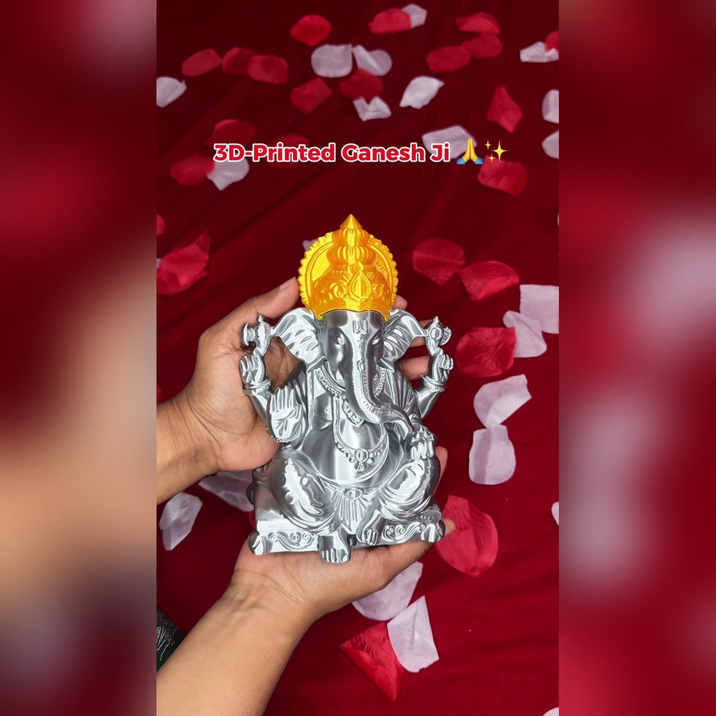 Hand holding the 3D-printed Ganesh Ji idol showing its size